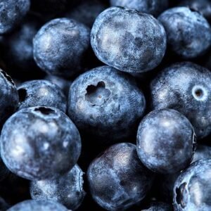 Close-up of blueberries with a dark and moody background