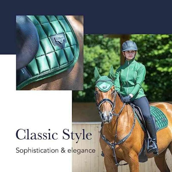 women in green riding suit matching with saddle pads sitting comfortably on the horse wearing matching fabric crown